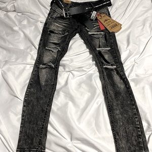 Ripped grey/black skinny jeans with belt
